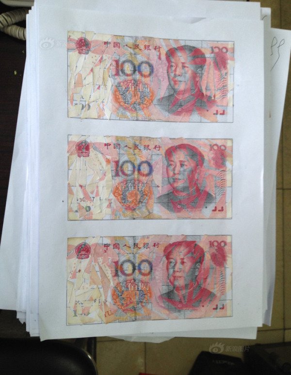 Семейная пара из Китая в течение трех месяцев склеивала измельченные купюры на сумму в 21 000 долларов