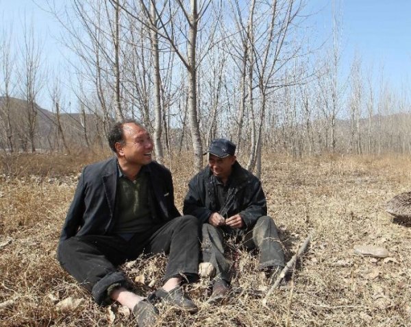 Дуэт китайских инвалидов посадил более 10 000 деревьев