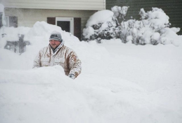 Мощные снегопады и сильные морозы обрушились на Канаду и США (30 фото)